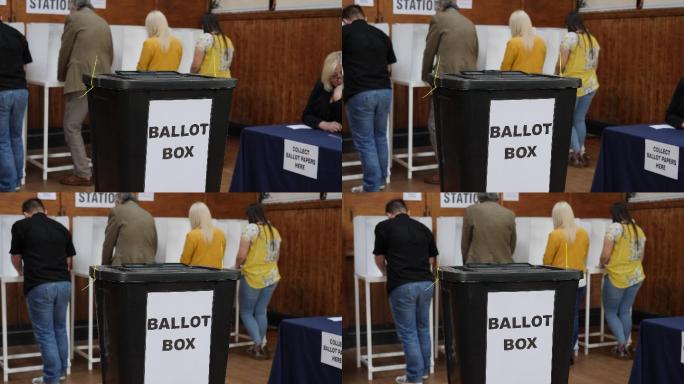 在选举时将选票放入投票箱