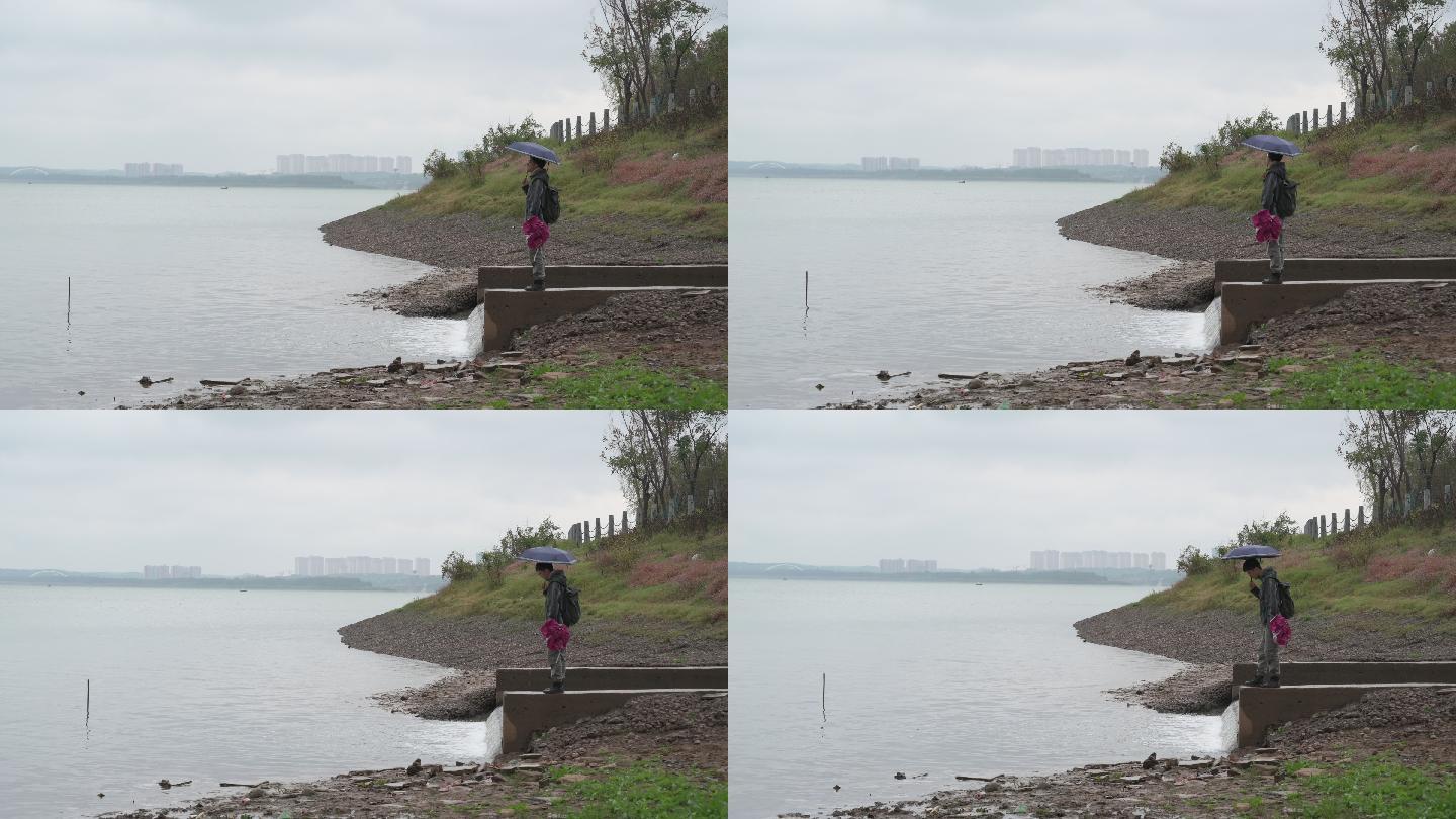 下雨湘江边孤独的人影