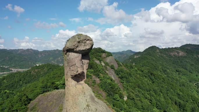 侧面倒飞拉高航拍温岭石夫人