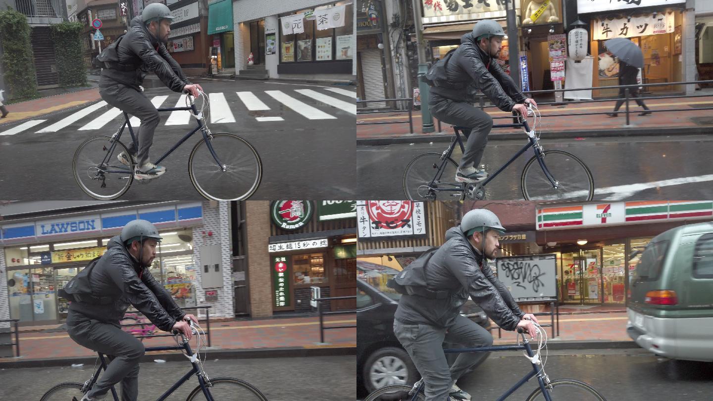 自行车信使在多雨的东京骑行