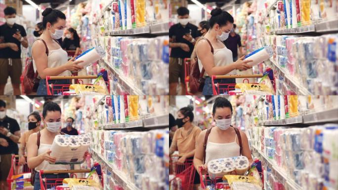 一位戴着口罩的年轻女子在超市购物