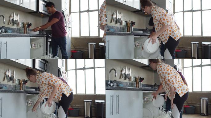孕妇和男友在阁楼公寓装洗碗机