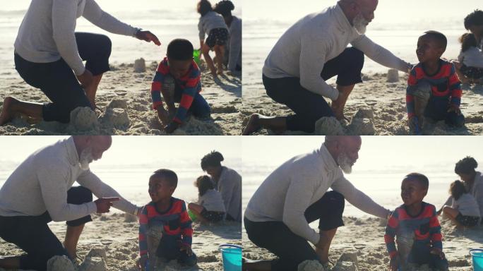 一个老人和他可爱的孙子在海滩上玩耍
