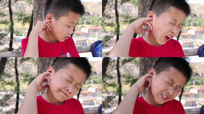 小孩子耳朵疼手指挖耳朵