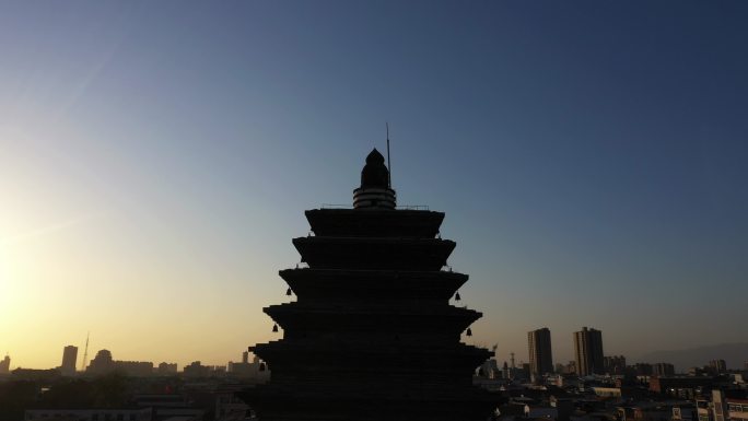 落日下的沁阳天宁寺三圣塔