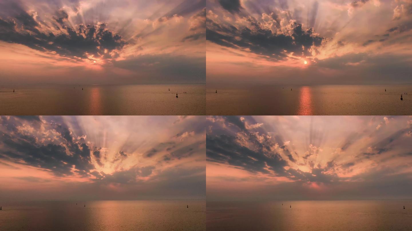 航拍 大海海面夕阳上帝之光延时视频