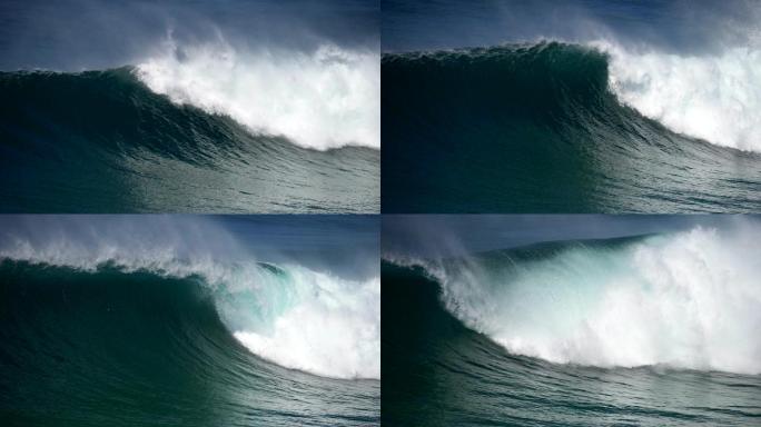 巨大的海浪缓慢地翻滚并撞击海岸
