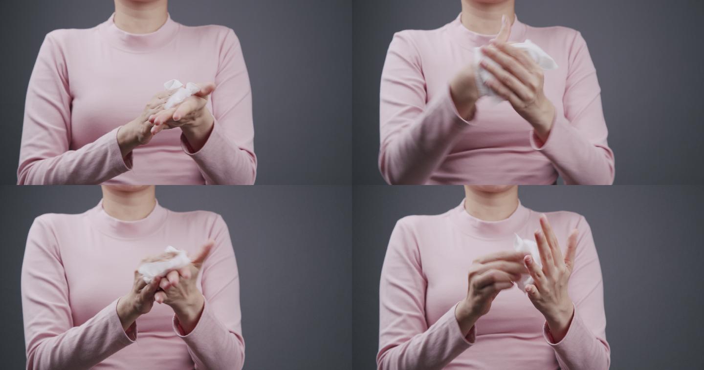 亚洲妇女用婴儿擦纸清洁脏手