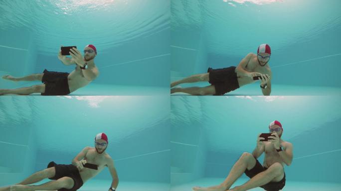 男子在水下用手机自拍
