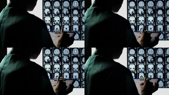 检查脑部X光扫描，做笔记，做出诊断