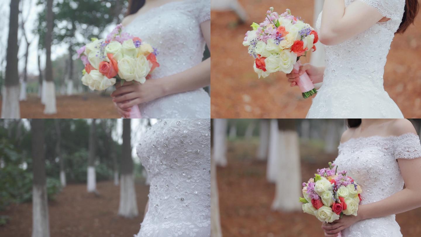 新娘拿着手捧花