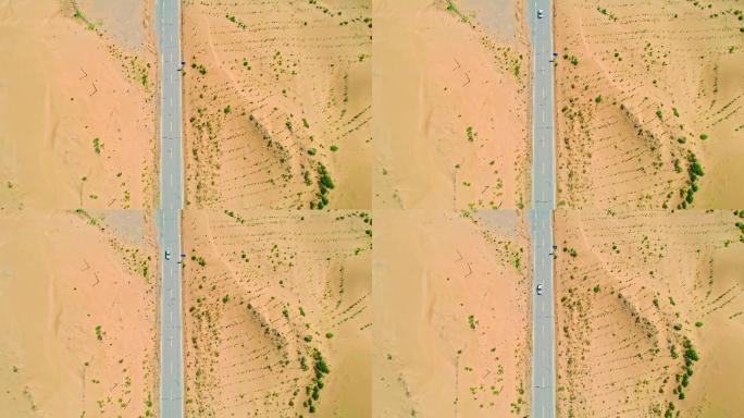 航拍汽车穿过沙漠