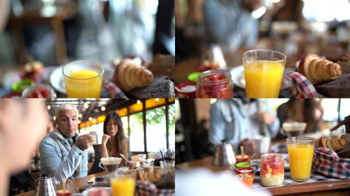 在自助餐厅为一群朋友提供早餐的女服务员