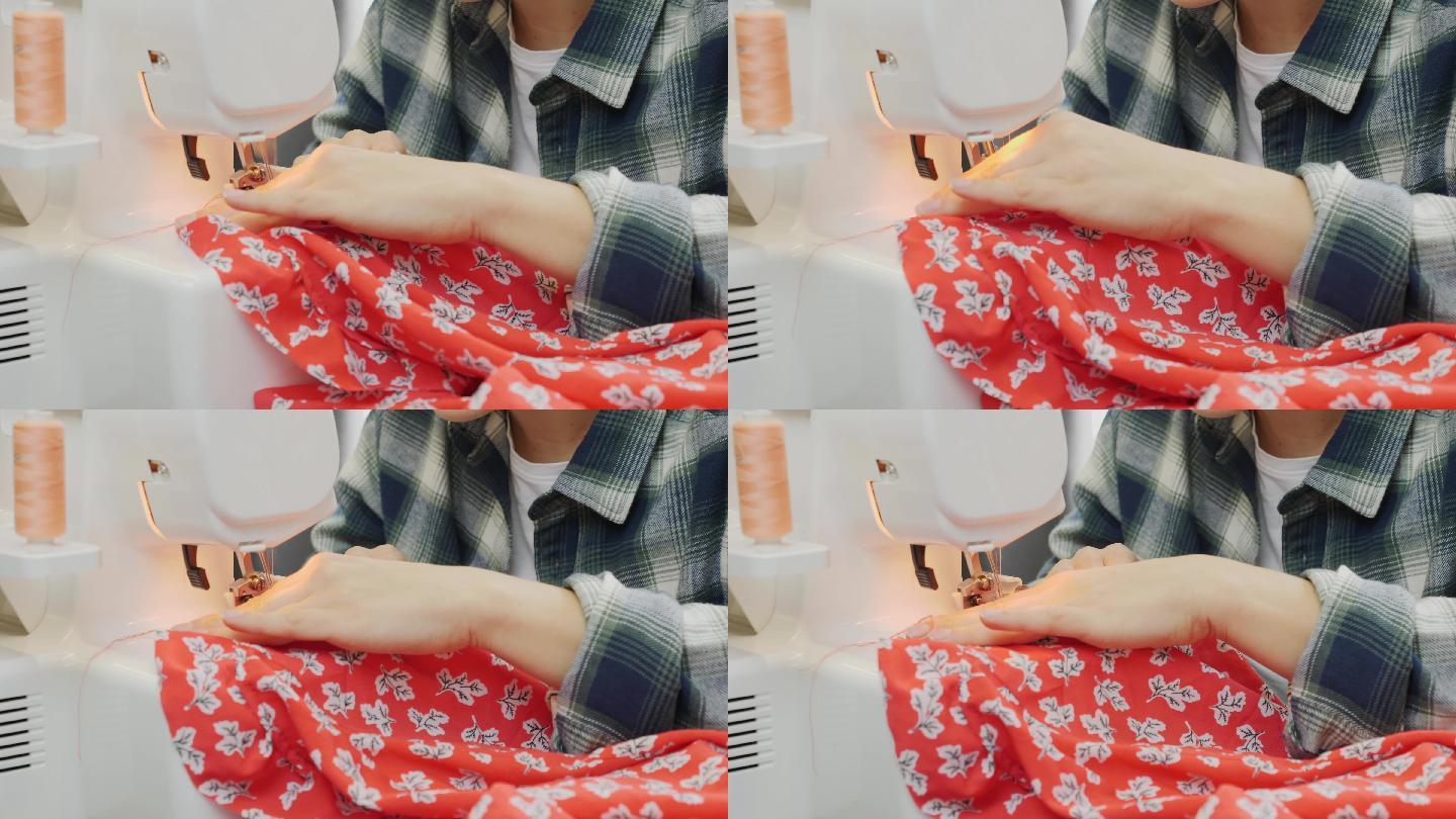 女人的手缝在包上的特写镜头。