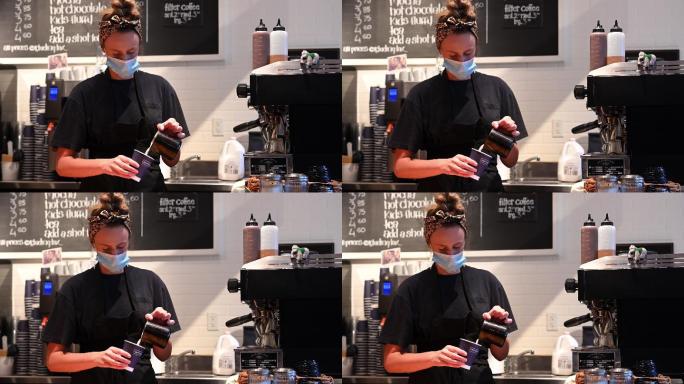 戴防护面罩的女咖啡师