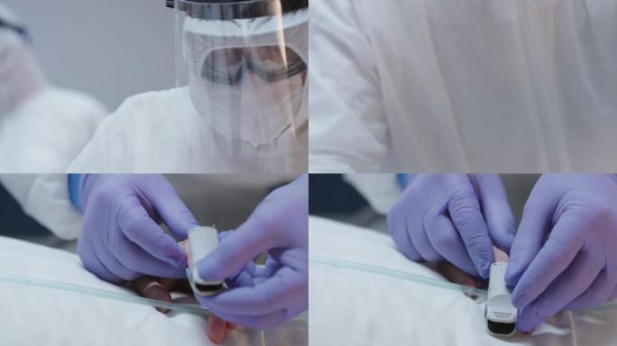 身穿防护服的医生在冠状病毒患者的手指上使用血氧仪