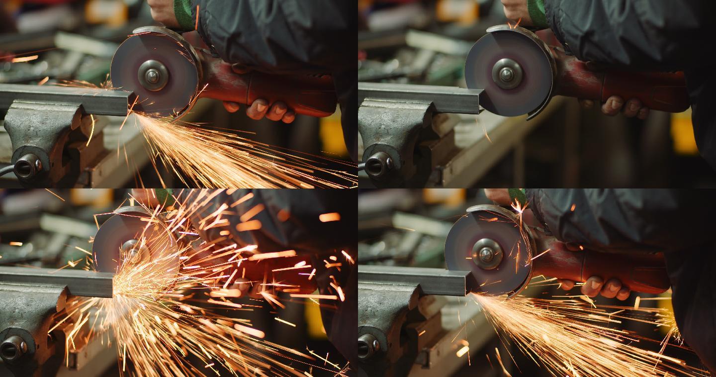 钢铁工业-人用角磨机磨削金属物体。