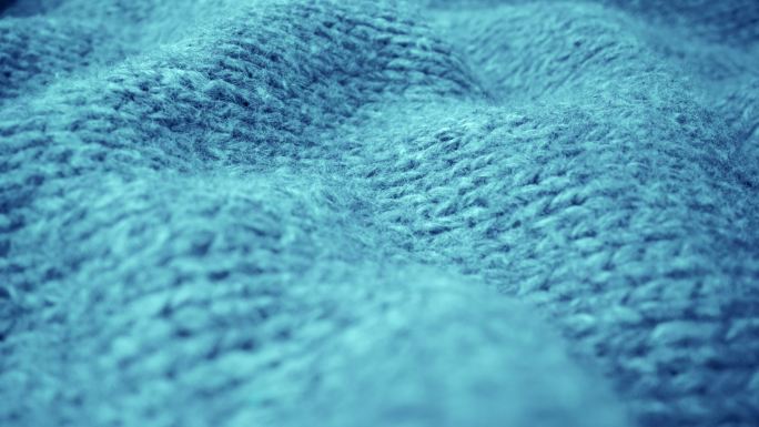 羊毛织物纹理流动的极端细节视图。