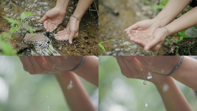 用手捧水喝 喝溪水