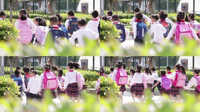 小学生少先队员红领巾放学上学开心走路