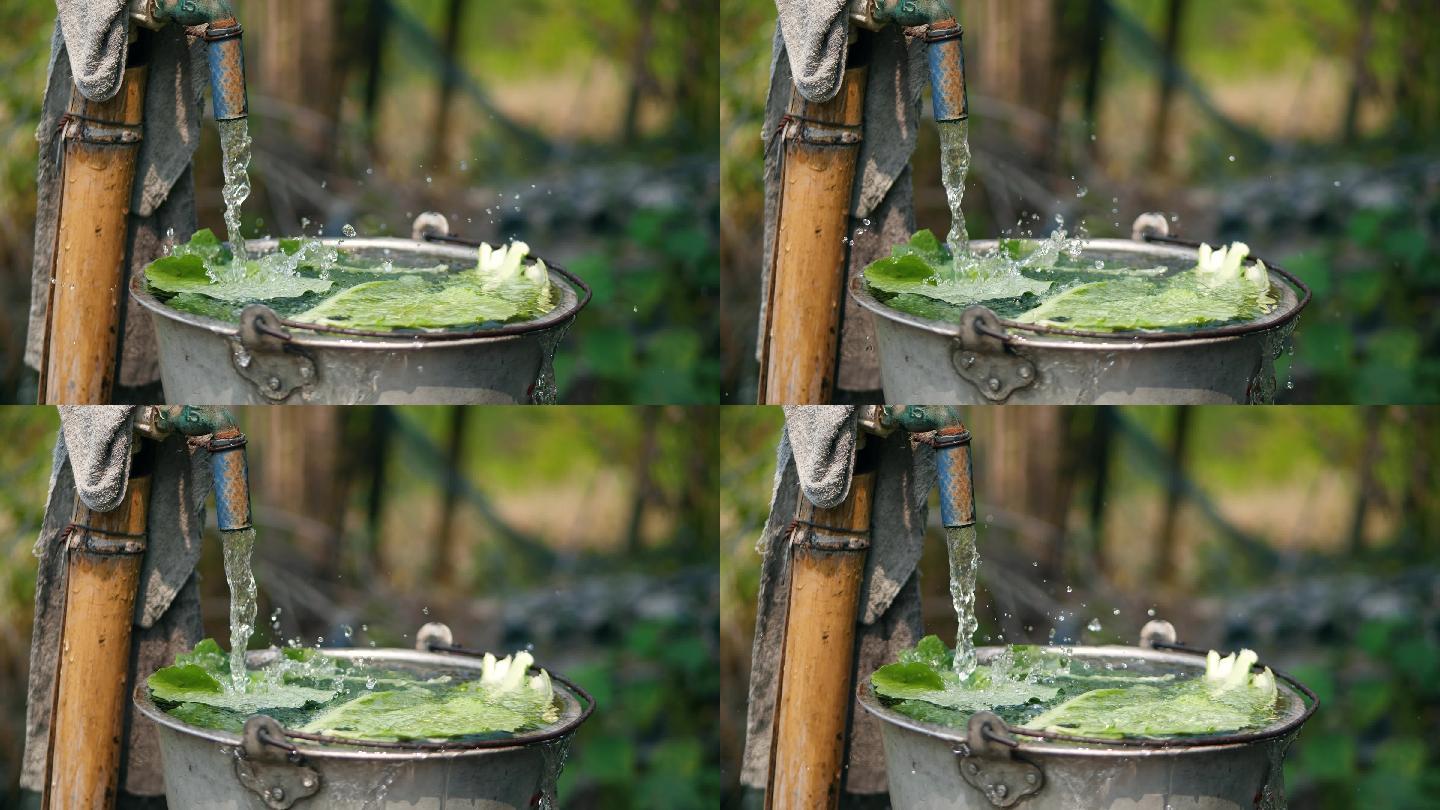 农村生活，一个正在放水冲洗蔬菜的水龙头