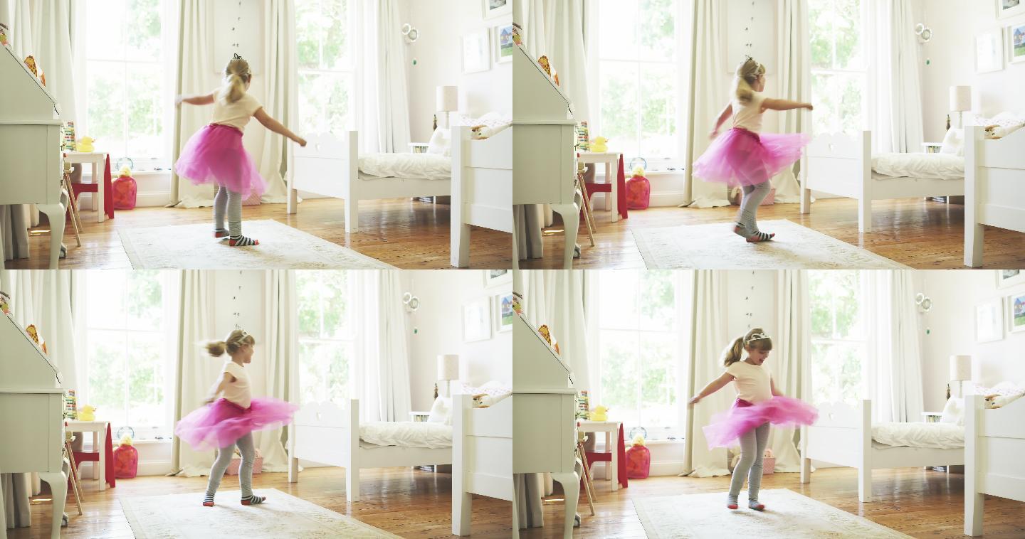 小女孩扮成仙女在家里的房间里跳舞