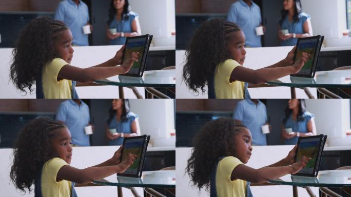 小女孩用数字平板电脑绘图