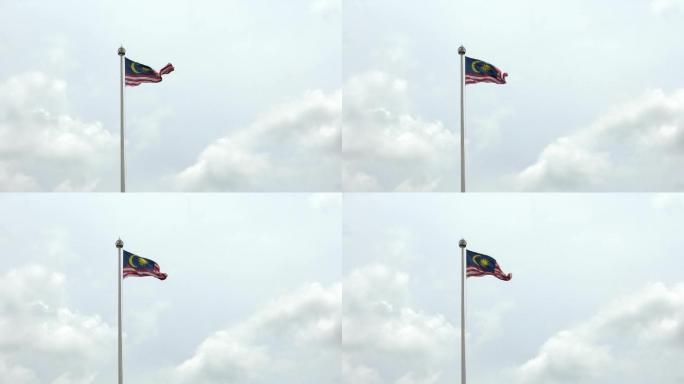 吉隆坡旗杆上马来西亚国旗迎风飘扬的慢动作