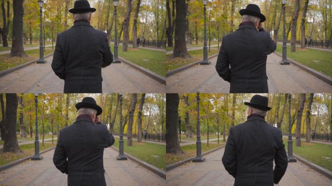 公园里散步的老人幸福生活手牵手白发