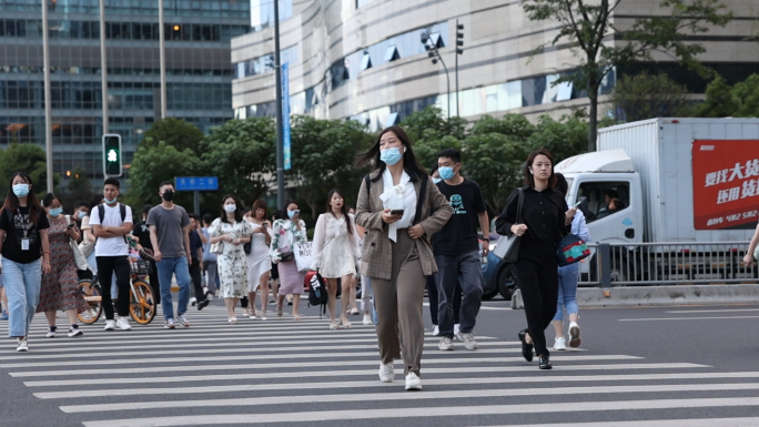 繁忙都市、上下班的人群