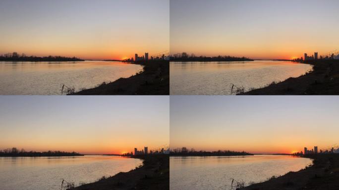 4K实拍夕阳下的城市江边