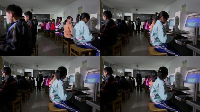 贫困地区的小学生在电脑教室上课