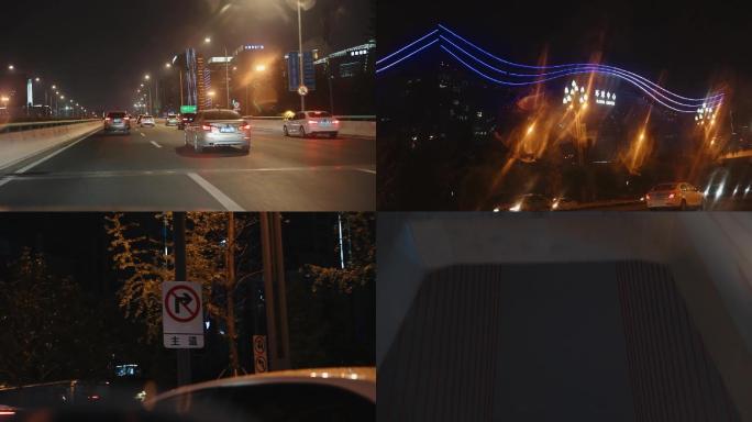 繁华城市夜晚车辆行驶镜头