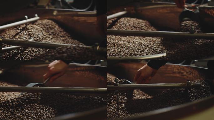 工人在机器中搅拌咖啡豆
