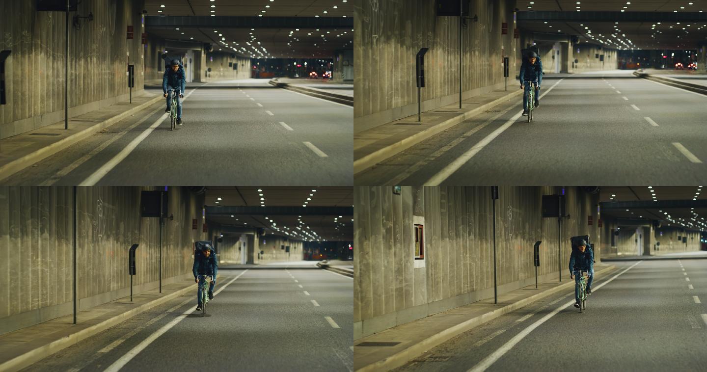 一个骑着自行车的快递员在街道上