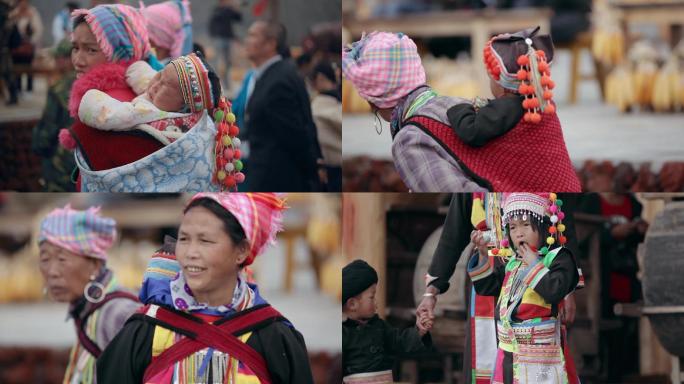 少数民族视频云南德宏傈僳族背小孩的妇女