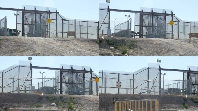 沿着美国和墨西哥边境的围栏的平移镜头