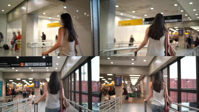 在机场行走的年轻女旅行者-戴着口罩