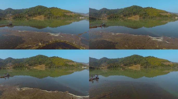 倒影视频中国西南农村里的湖水倒影骑车游客