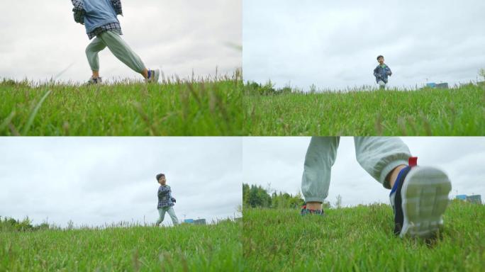 绿色草地奔跑的小孩慢动作