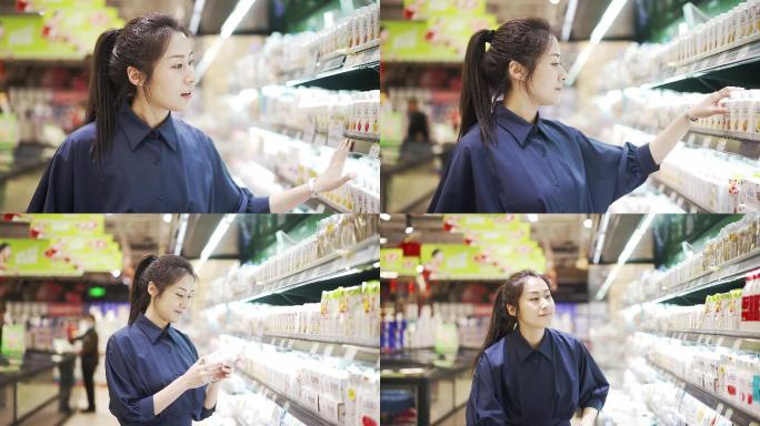 年轻中国女性在超市选购牛奶