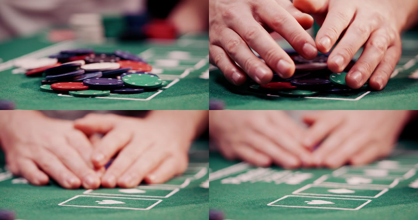 赌徒从扑克桌中央抓取所有扑克筹码