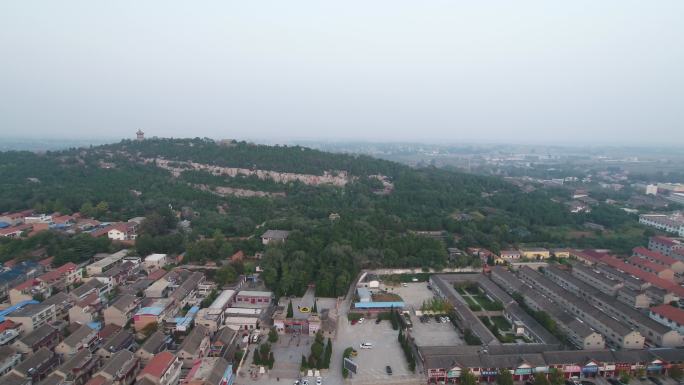 大伾山风景区航拍城市防区山川松柏