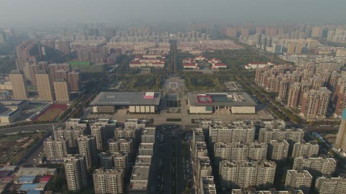 许昌博物馆场馆建筑航拍远景推近城市建筑