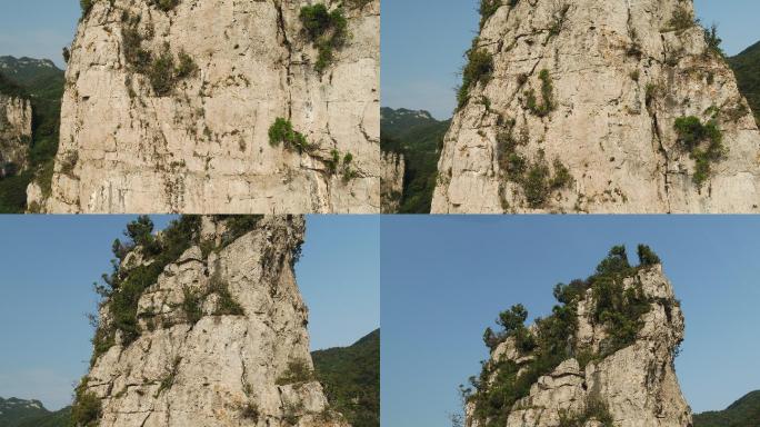 航拍阳光蓝天岩石孤峰悬崖峭壁