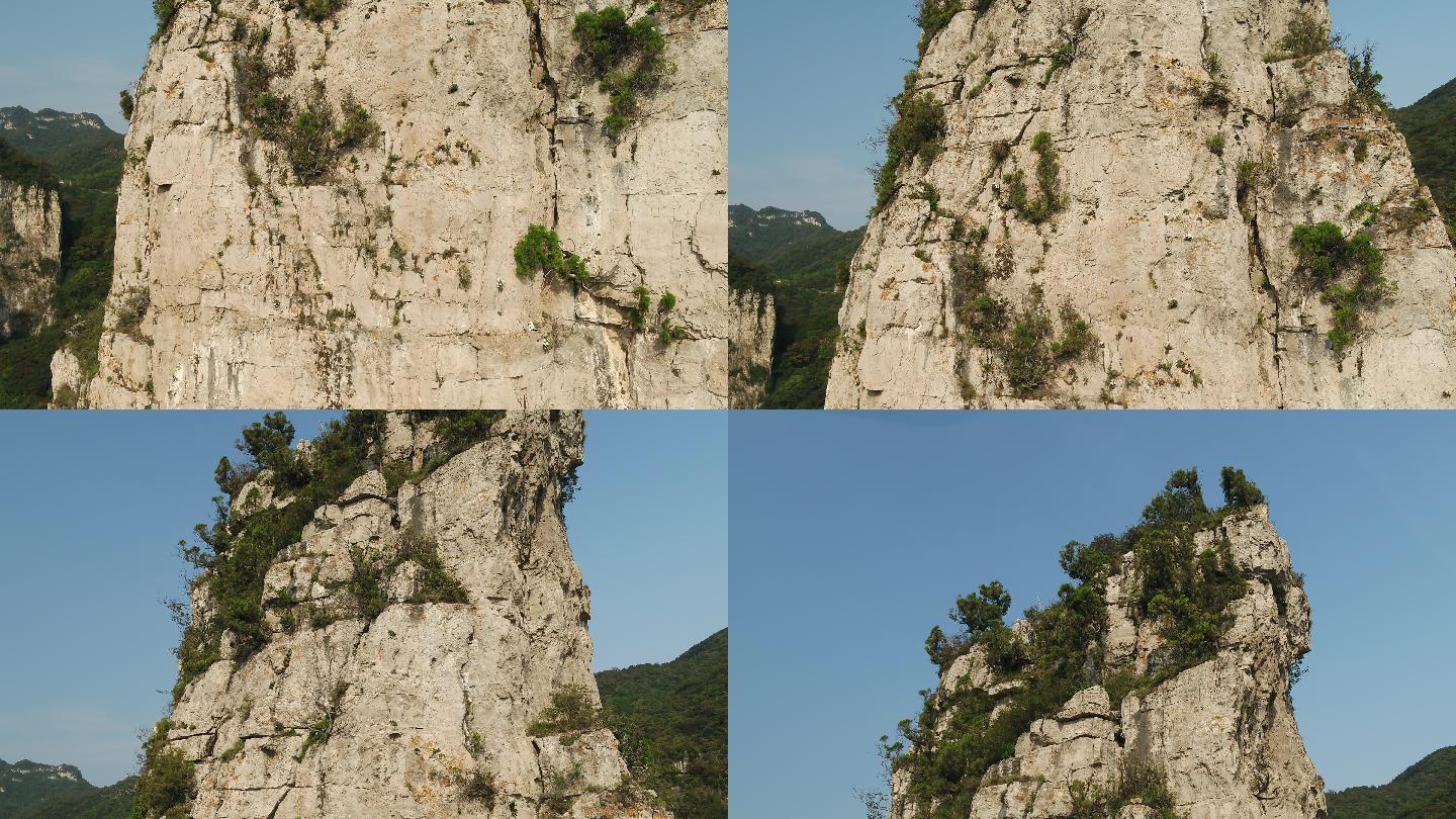 航拍阳光蓝天岩石孤峰悬崖峭壁