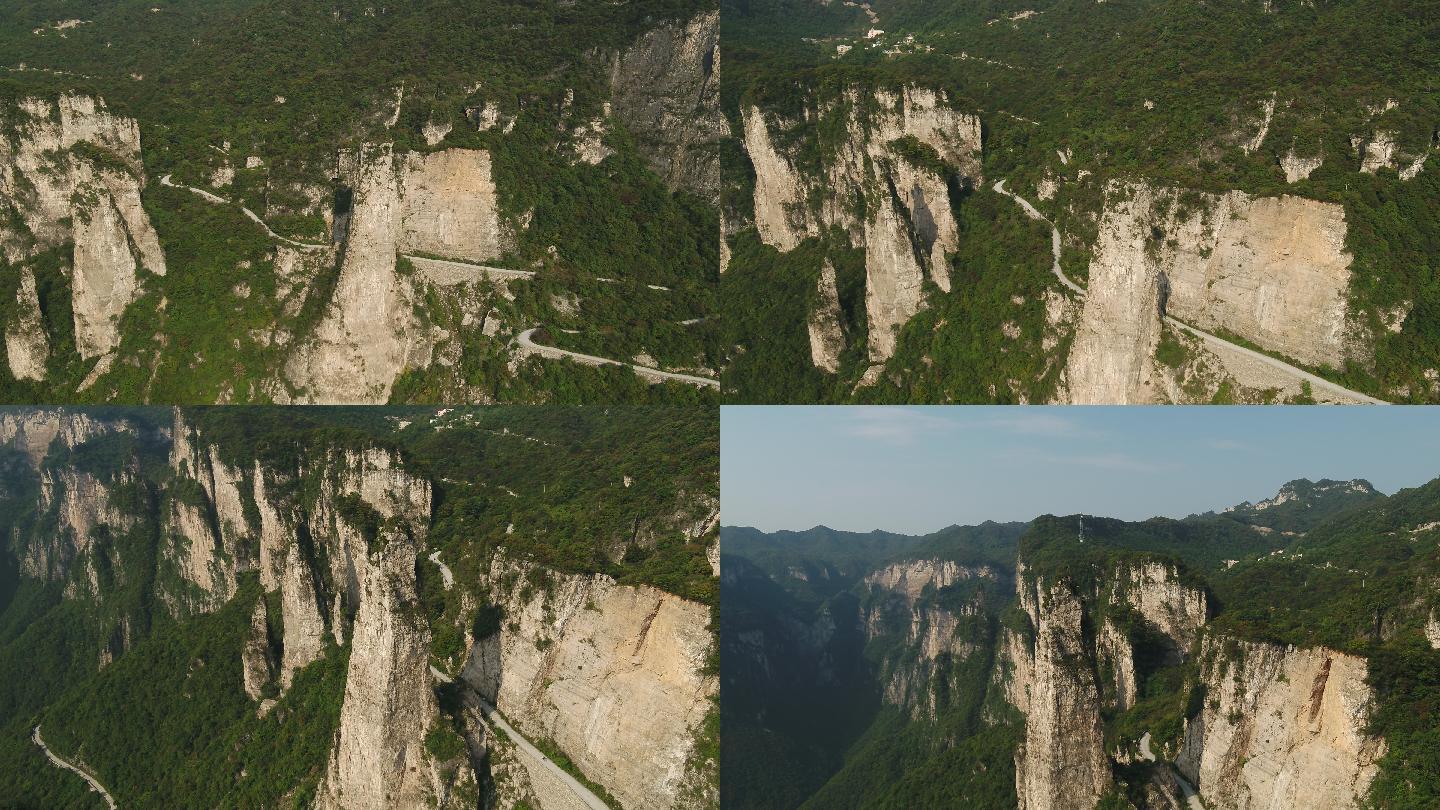 航拍阳光蜿蜒山脉树木岩石孤峰峭壁