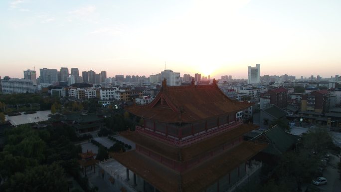 许昌城市建筑春秋楼全景航拍升夕阳