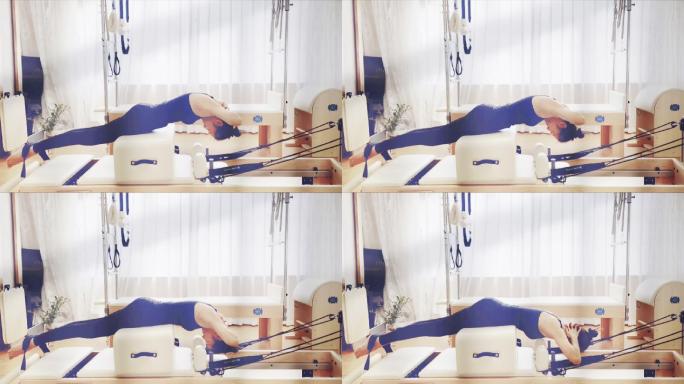 一女子锻炼脊柱瑜伽动作 有效预防颈椎病
