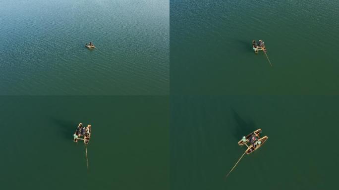 彰武南海水库清澈河流划船捕捞的人